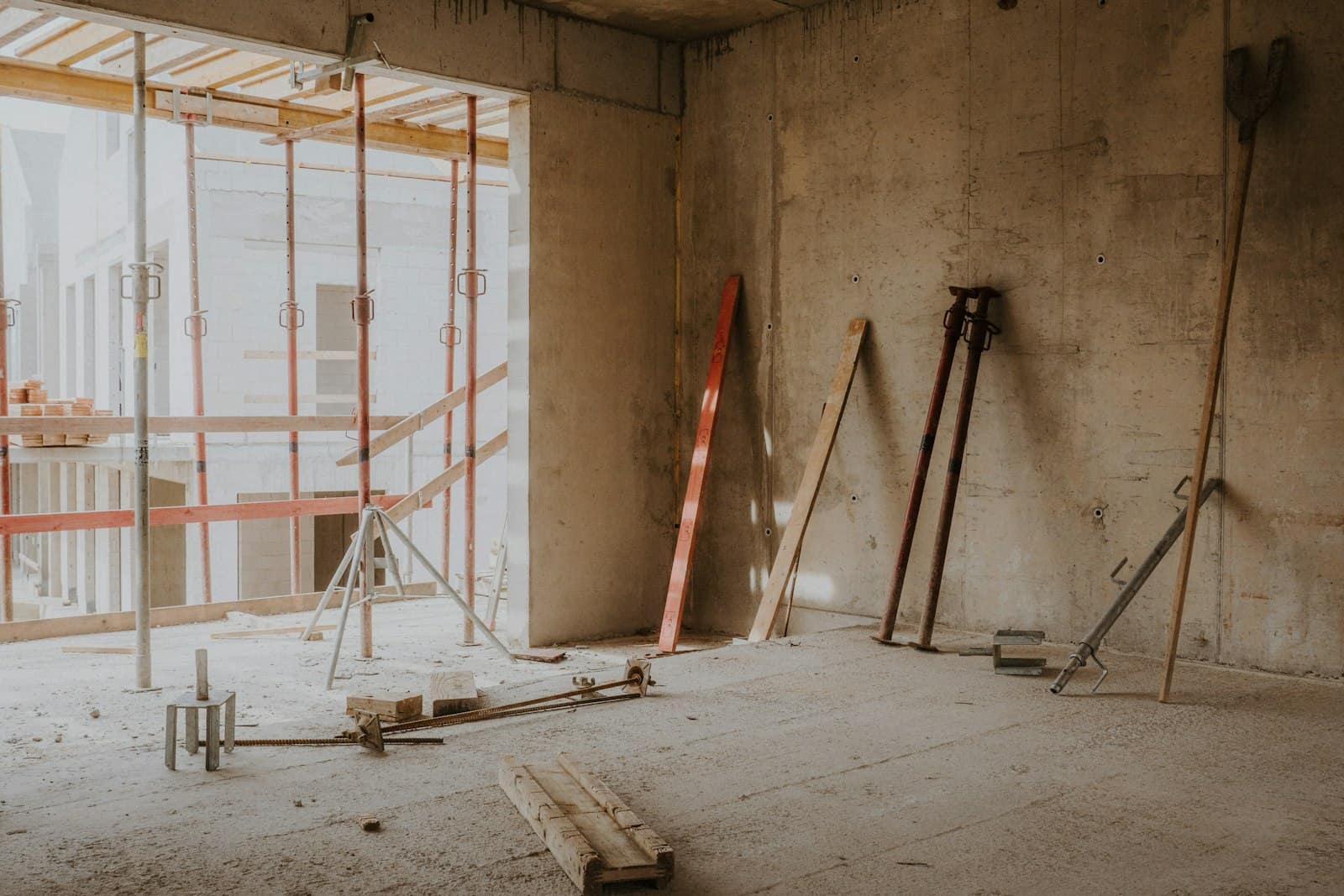 Interior being renovated, scaffold and bare walls
